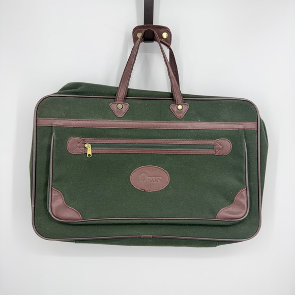 vintage Orvis Battenkill garment bag green canvas construction with leather trim